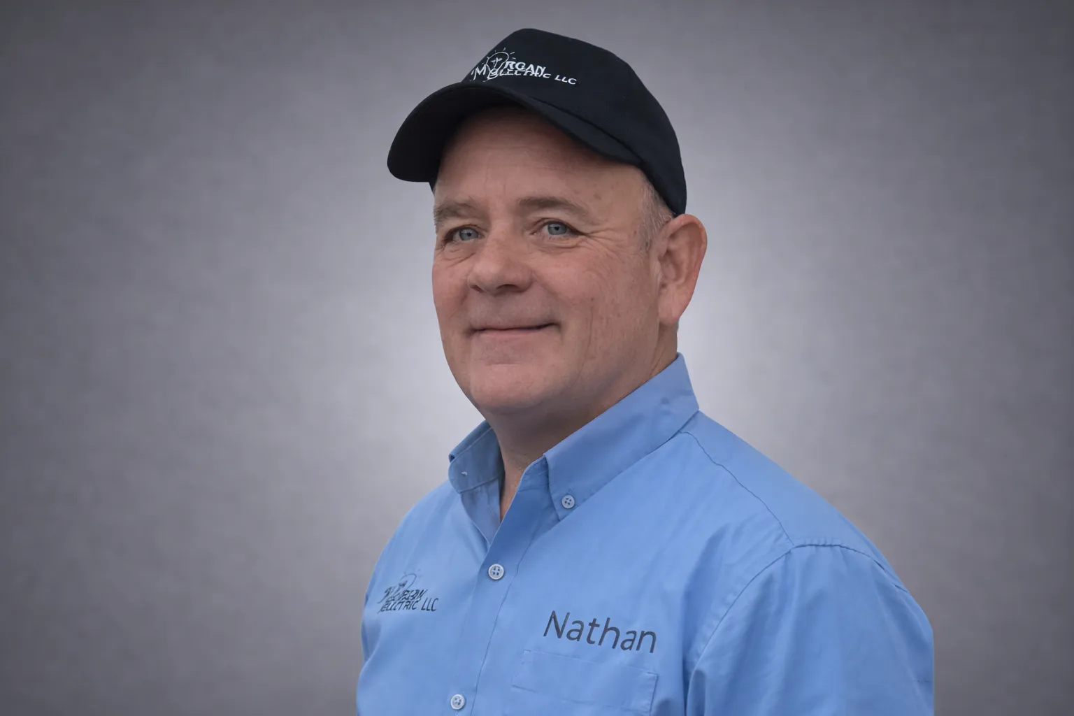 Nathan Morgan, owner of Morgan Electric LLC, in a company cap and shirt